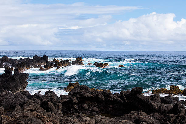 istock Waves Breaking on Dark Volcanic Rock in Hawaii 470776565