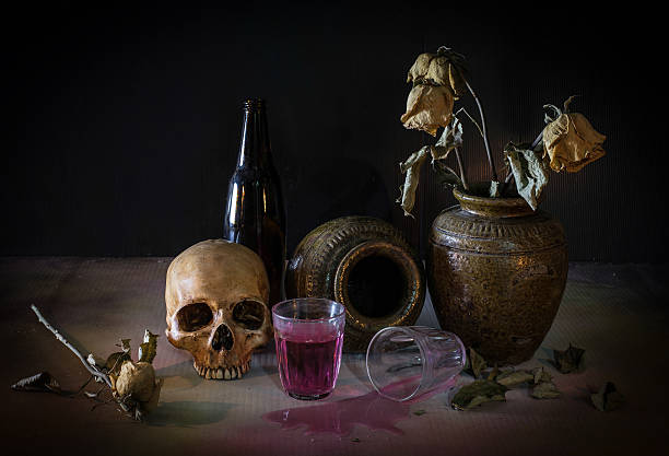 istock Skull with alcohol and sere flower,  Still Life Style 470778054