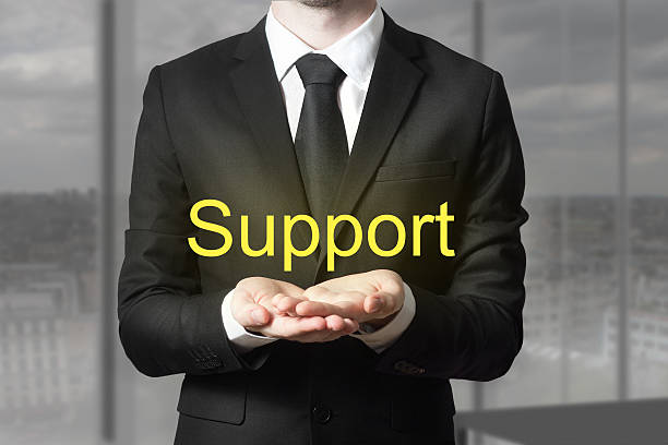 istock businessman in suit offering support hands open 470778142