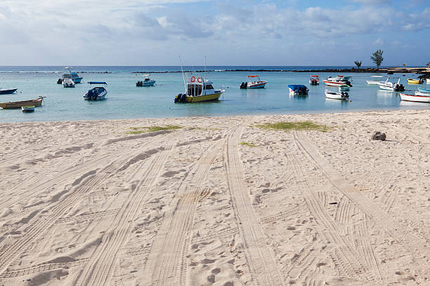 istock Fishing boats in sea at sandy beach 470779214
