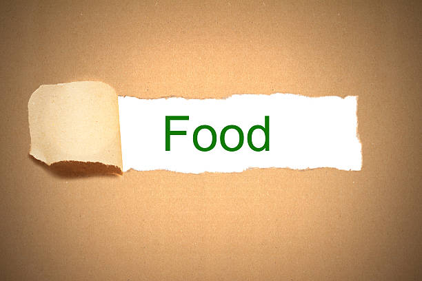 istock brown paper torn to reveal food 470779972