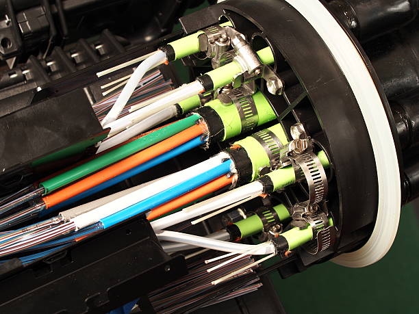 Fiber optic mass closure with cable entry port closeup Melbourne, Australia - April 19, 2015: Fibre optic mass closure with cable entry port closeup, National Broadband Network in Australia, a fast internet rollout covering most of Australia. broadband isp stock pictures, royalty-free photos & images