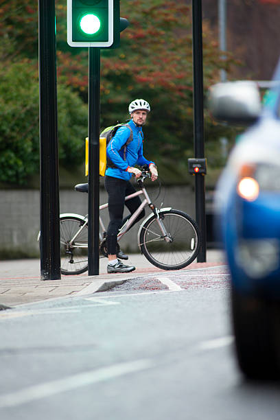 istock Man Riding Bike 470785125