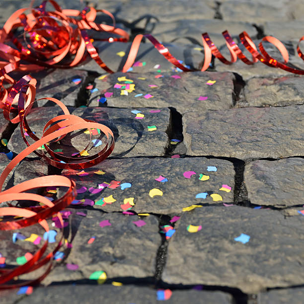 Celebration - streamers and confetti on the ground Celebration - streamers and confetti on the ground -  symbol for celebration and party fastnacht stock pictures, royalty-free photos & images