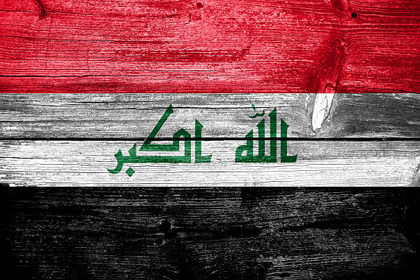 istock Iraq Flag painted on old wood plank texture 470786365