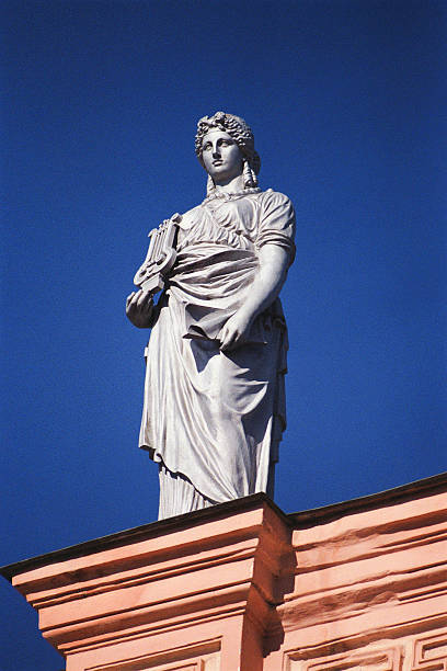 istock Sculpture above the cornice of  building . 470786819