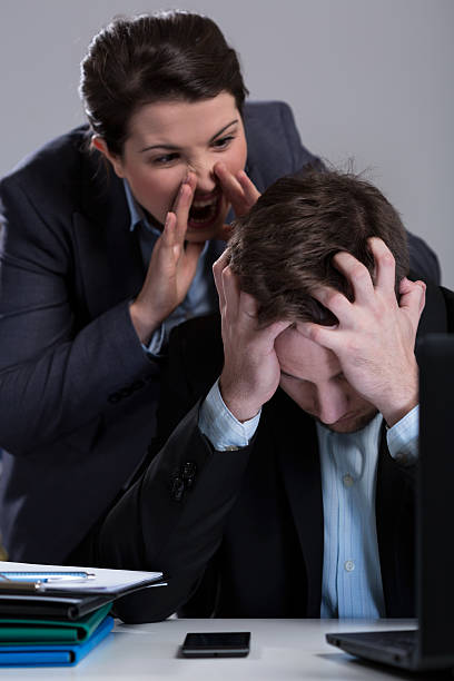 istock Crazy boss yelling at employee 470789474
