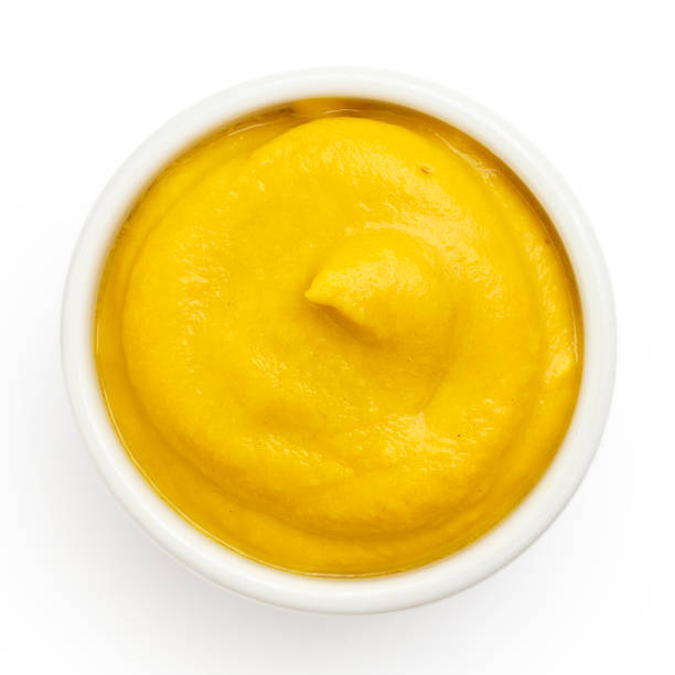 istock Typical american smooth yellow mustard in round dish 470790134