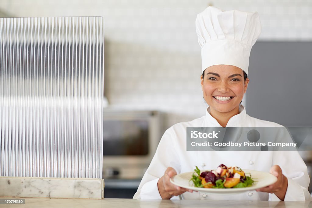 I've worked my magic and prepared this dish for you Cropped shot of an attractive female chef in the kitchenhttp://195.154.178.81/DATA/i_collage/pu/shoots/795704.jpg 2015 Stock Photo