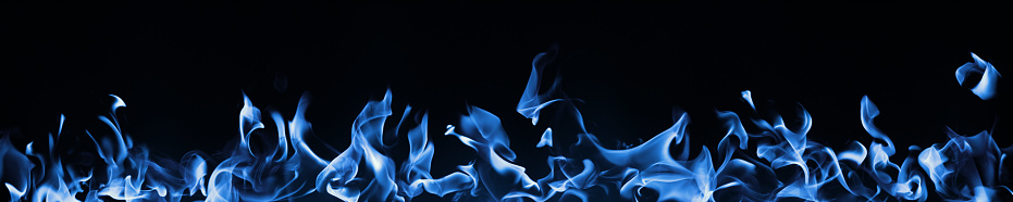 Blue Fire Isolated on Black. Gas Energy.