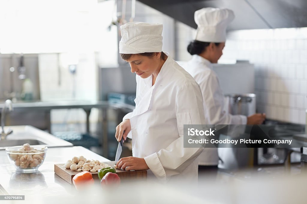 Taking care in each step of the culinary process Cropped shot of two young female chefs in the kitchenhttp://195.154.178.81/DATA/i_collage/pu/shoots/795704.jpg 2015 Stock Photo