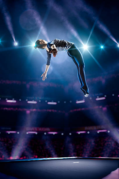 istock Young girl is jumping on trampoline 470796046