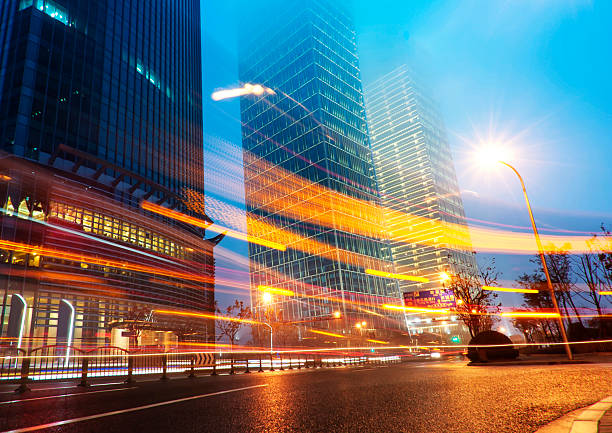 istock light trails on the modern building background in shanghai china. 470796277