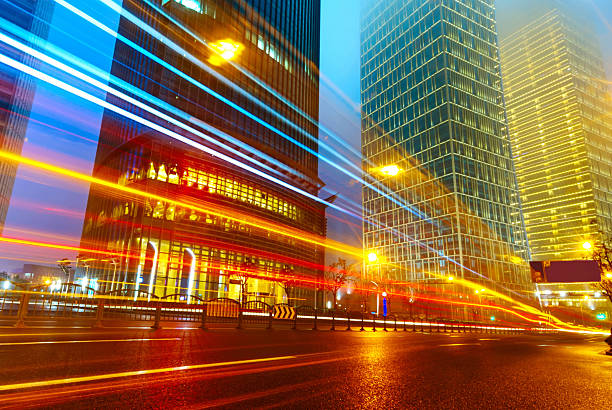 istock light trails on the modern building background in shanghai china. 470796319