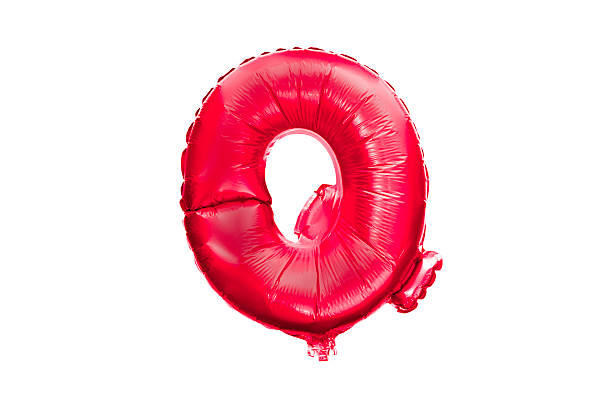 istock Red foil balloon alphabet letter Q isolated on white 470796554