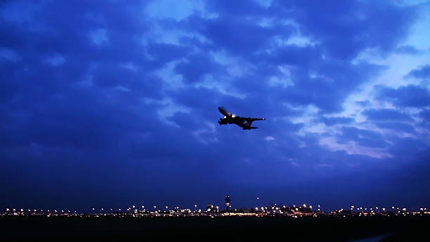 istock Airplane taking off in the night 470796984