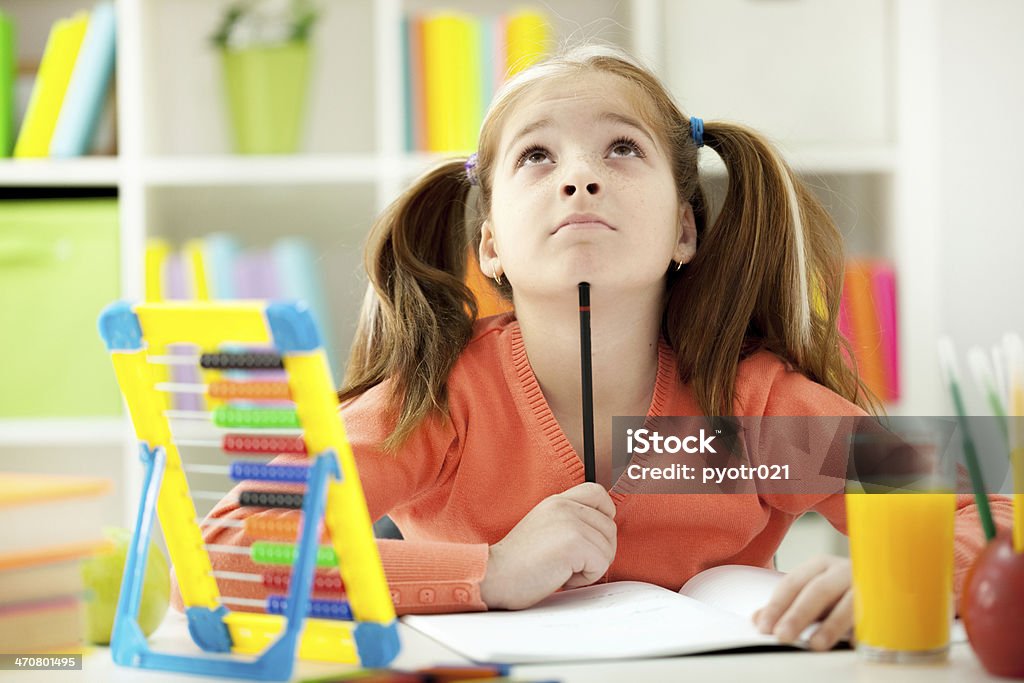 Small red-haired girl daydreaming cute little red-haired girl daydreaming Above Stock Photo