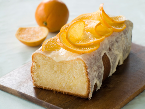 Orange cake with icing, selective focus