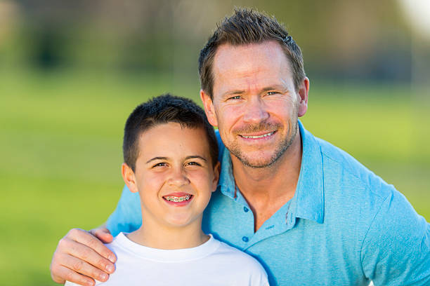 istock Portrait of father and son 470802089