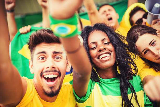istock Group of brazilian supporters at stadium 470802589