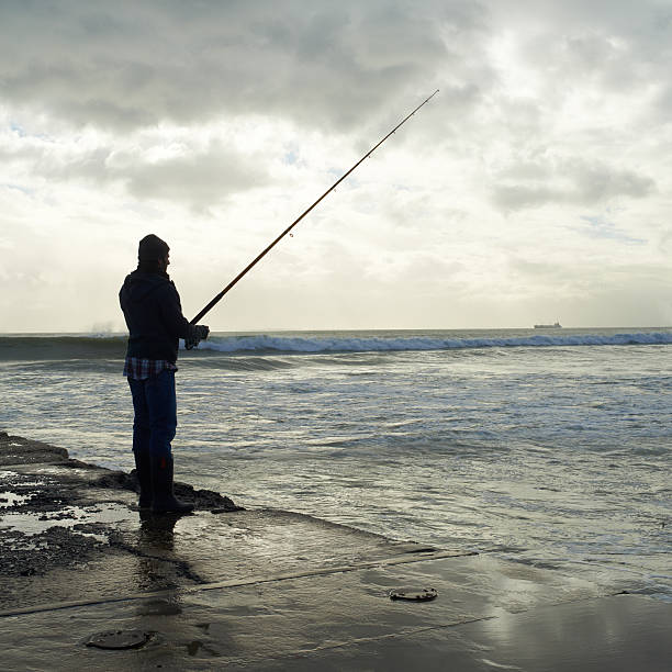 istock Fishing gives him time to think... 470803713
