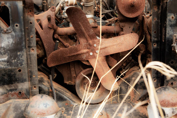 istock Transportation: Old vehicle engine inside car at junkyard.  Motor fan. 470804103
