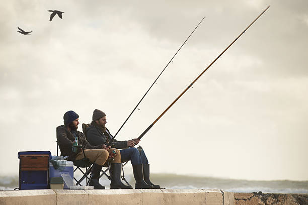 8,400+ Two Men Fishing Stock Photos, Pictures & Royalty-Free Images -  iStock