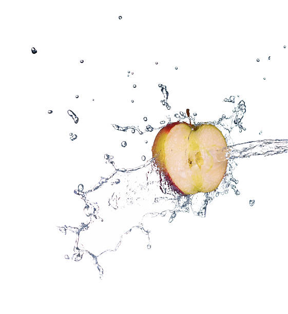 istock Green apple with water splash in spray of water 470806440