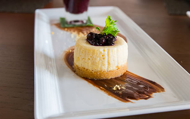 istock Blue berry cheese cake served with berry sauce 470808762