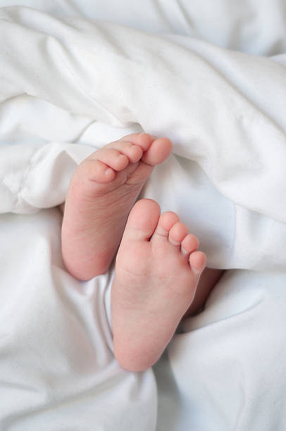 istock feet of a sleeping baby 470811992