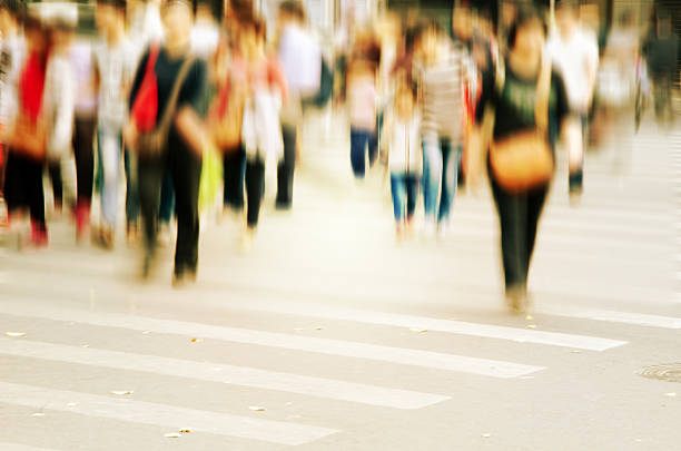 istock People walking on big city street 470812396