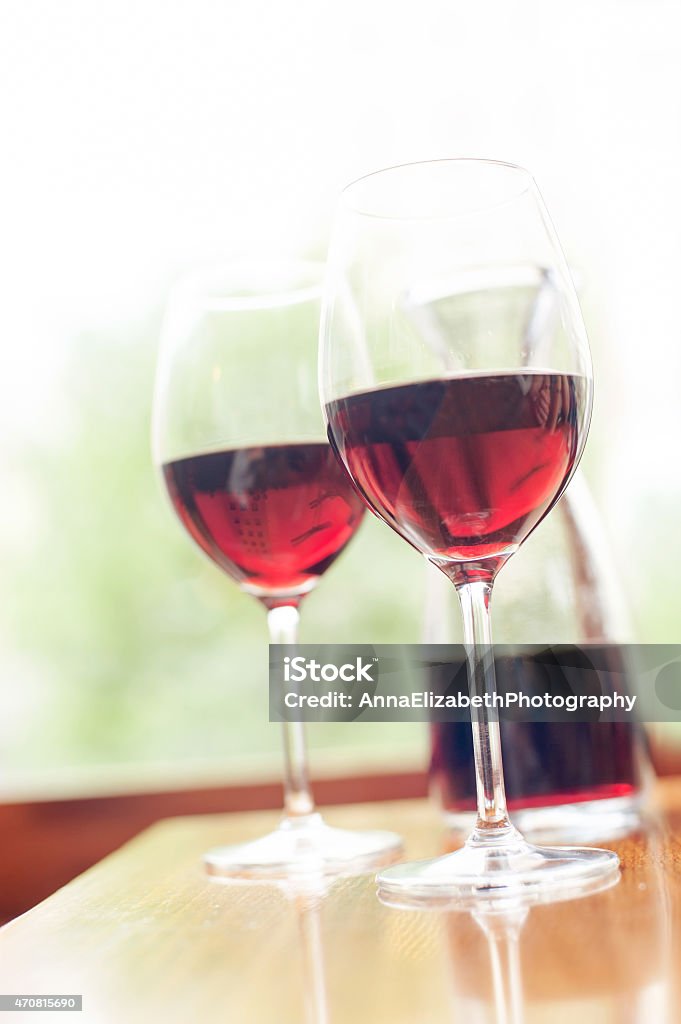 Two glasses of delicious red wine. Vintage filter Two glasses of delicious red wine. Vintage filter. Indoors. No People Stock Photo