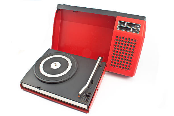 istock Vintage record player - portable turntable isolated on white 470815888