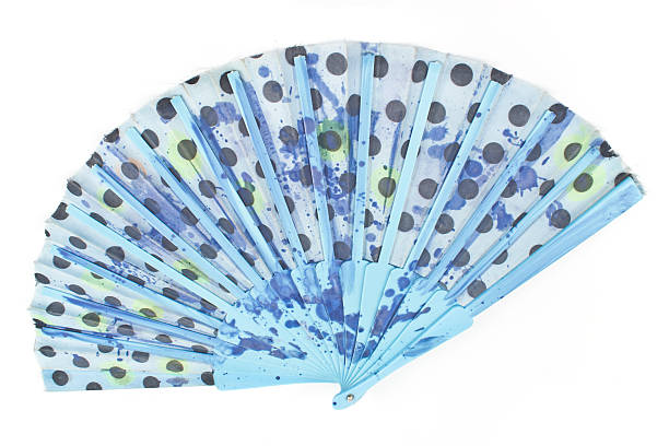 istock Blue polka dot hand fan isolated on white 470815916
