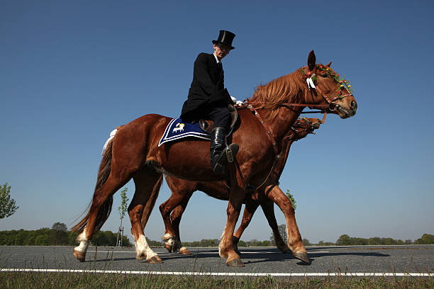 Ralbitz, Germany - April 24, 2011: Easter Riders attend the Easter ceremonial equestrian procession in the Lusatian village of Ralbitz near Bautzen, Upper Lusatia, Saxony, Germany.