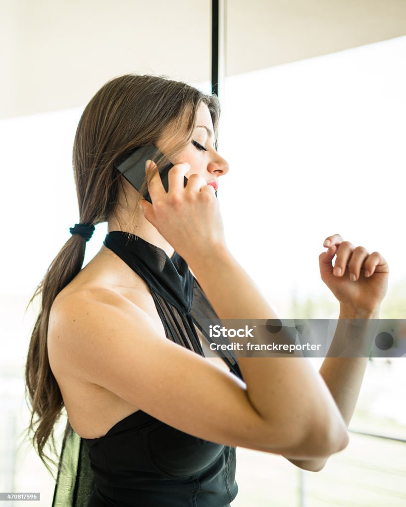 posh beautiful woman on the phone inside the hotel woman on the phone at the hotel 20-29 Years Stock Photo