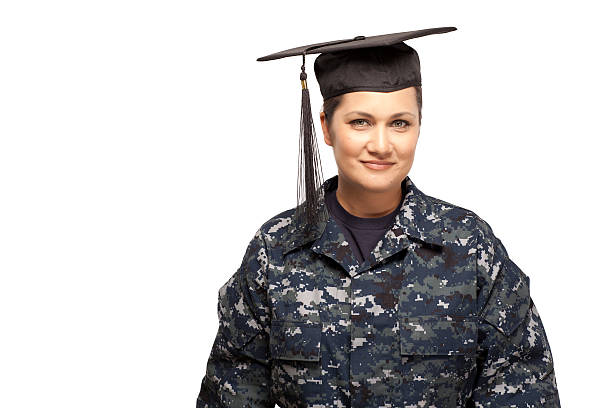 istock Navy sailor wearing graduation cap 470824026