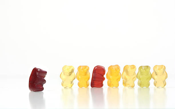 istock gummy bears - young man in puberty 470825648