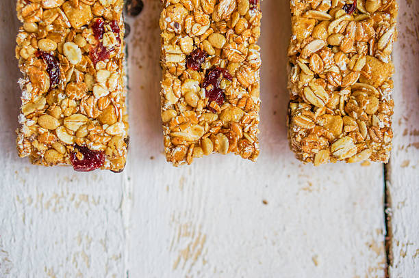 istock Granola bars on wooden background 470826473