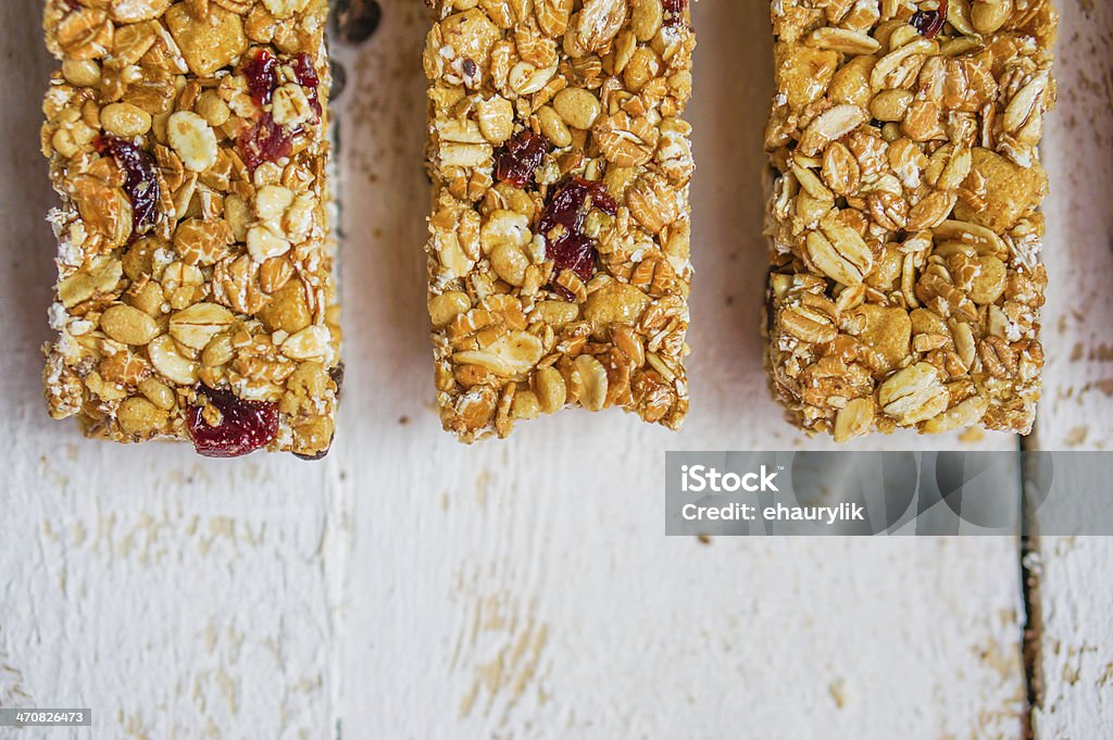 Granola bars on wooden background Backgrounds Stock Photo