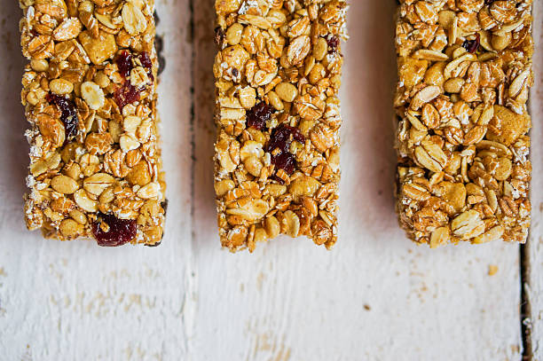 istock Granola bars on wooden background 470826499