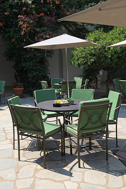 istock Iron tables and chairs in beautiful patio 470828419