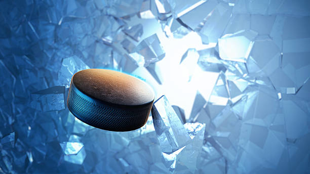 Hockey puck in water with view of broken ice above 3d rendered illustration of an hockey puck burst through ice. ice hockey net stock pictures, royalty-free photos & images