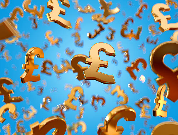 Golden pound sterling signs raining. Golden pound sterling signs falling on the blue background. pound symbol stock pictures, royalty-free photos & images