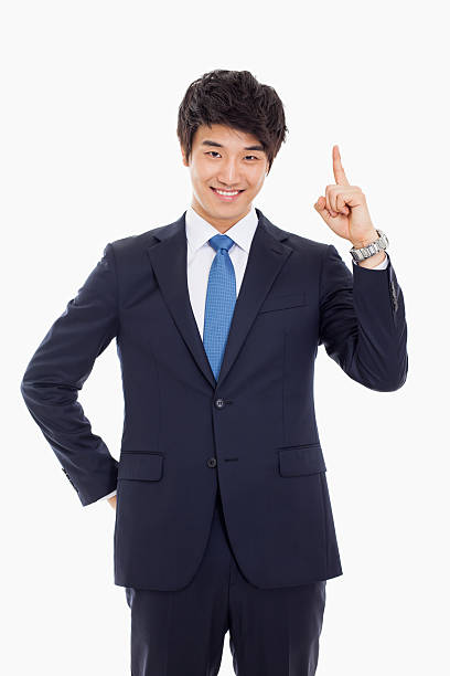 istock Young asian man indicated up side. 470831387
