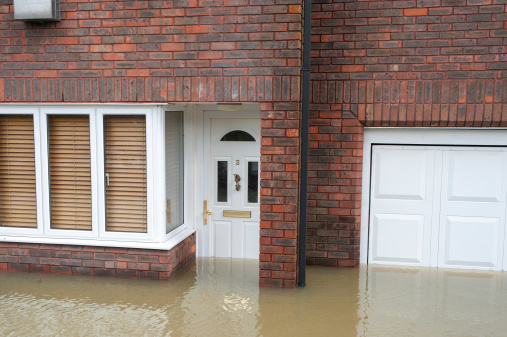 Windsor, UK - 11 February 2014: One of many local homes flooded when the River Thames near Windsor, UK burst its banks after weeks of heavy rain.