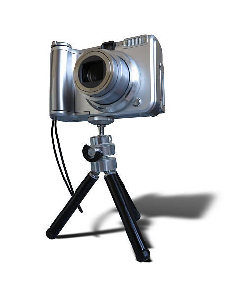 istock Gray digital photo camera on tripod isolated over white 470834099