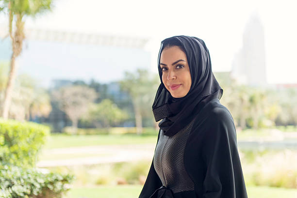 istock Emirati woman in the park 470834428