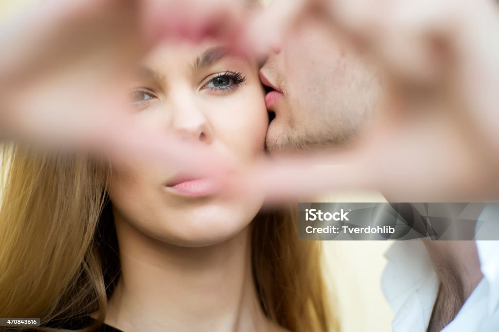 Nice beautiful couple Nice beautiful couple, guy kissing agirl, horizontal picture 2015 Stock Photo