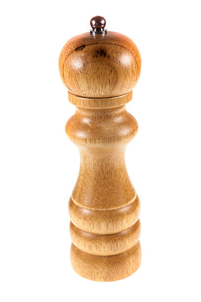 istock Wood pepper shakers on white background. 470847956